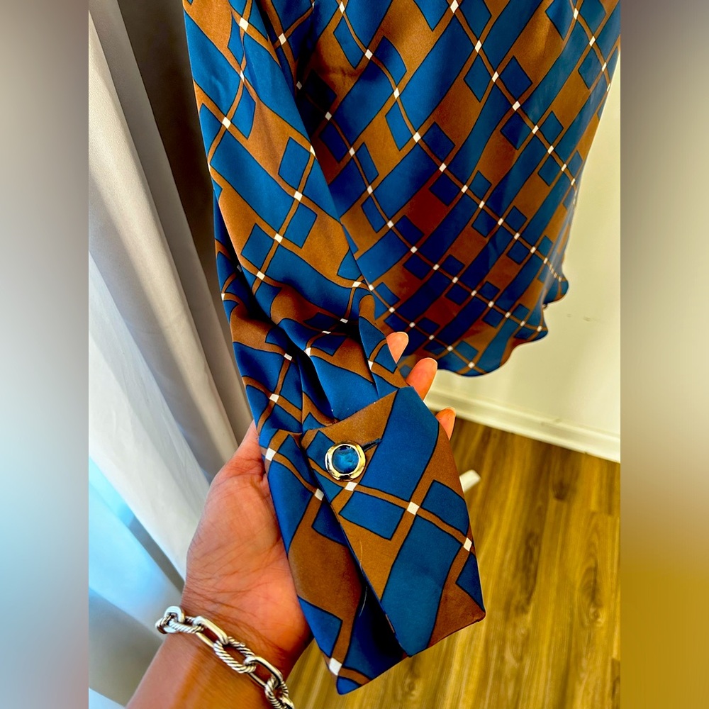 Chocolaté and Royal Blue long sleeve blouse with gem detail on cuff.